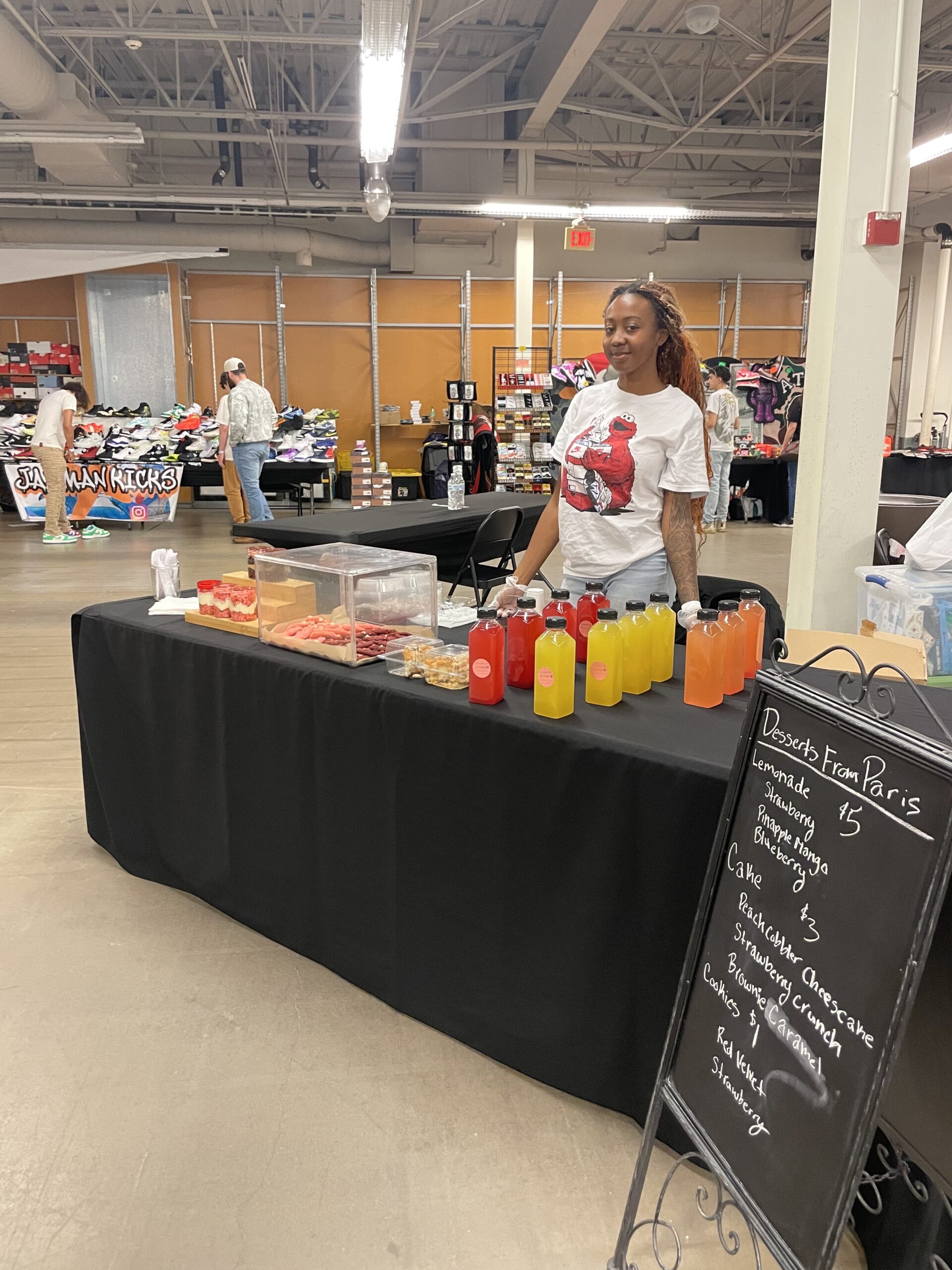 Food vendor at 785 Sneaker Fest in Topeka, offering snacks and meals for shoppers.