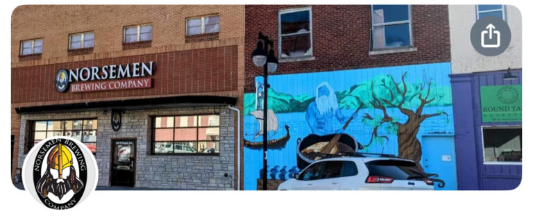 Norsemens Brewing Company storefront with Viking-inspired mural, featuring a Viking ship and tree, in Topeka, Kansas.