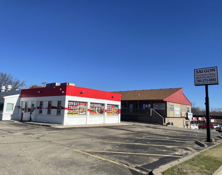 Exterior of the new Panchos Mexican Food location in Topeka, featuring bold signage, fresh paint, and custom window decals.