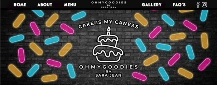 Homepage of OhMyGoodies featuring custom cakes and desserts, highlighting their Christmas cinnamon roll fundraiser and community-focused baking in Topeka, KS.